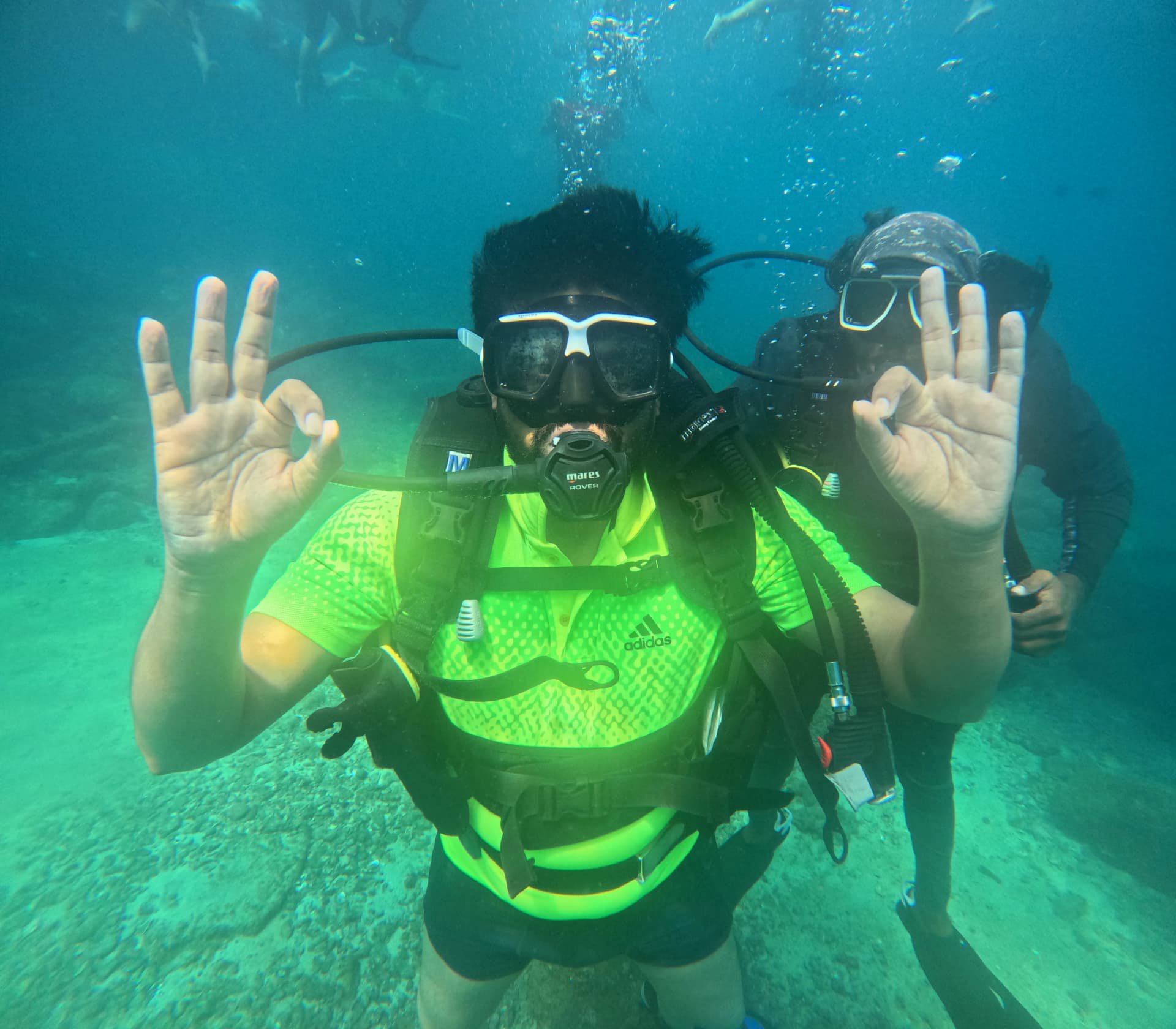 Healthy tropical coral reef ecosystem teeming with coastal marine life around Netrani Island